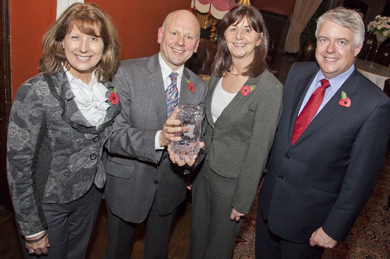 Mario Kreft receives his award from First Minister Carwyn Jones